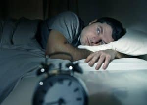 toss and turning at night while sleeping
